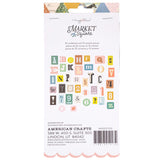 Cardstock with alphabet and number stickers on a white background